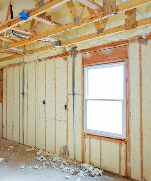 insulation in wooden house construction Heat isolation in a new prefabricated house with mineral wool and wood.